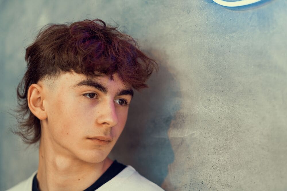 man met een mulletkapsel